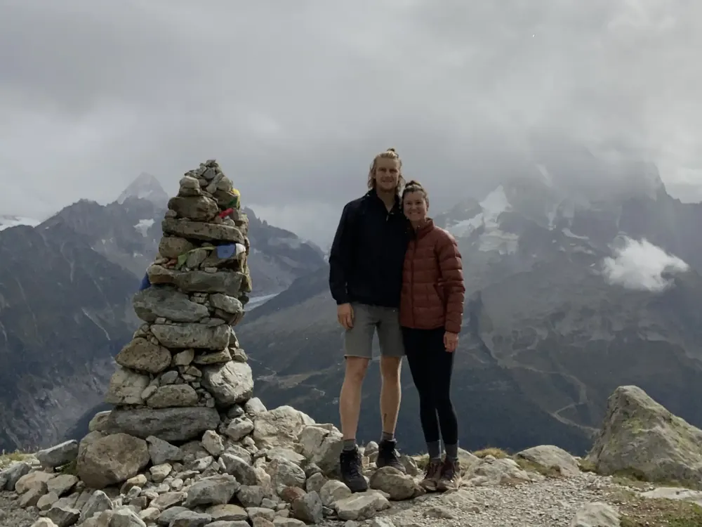 Trevor and Katelyn at a summit cairn