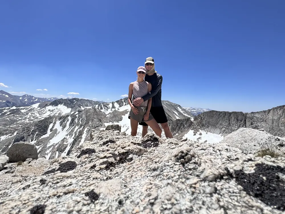 Trevor and Katelyn on a mountain summit