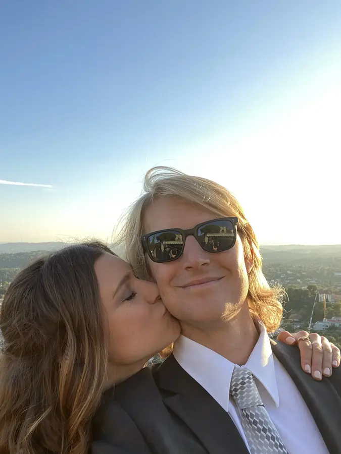 Trevor and Katelyn overlooking the coast at sunset